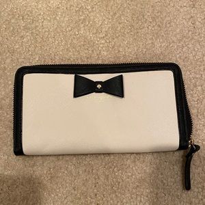 Kate Spade tan/cream and black wallet with bow